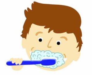 Chico lavándose los dientes